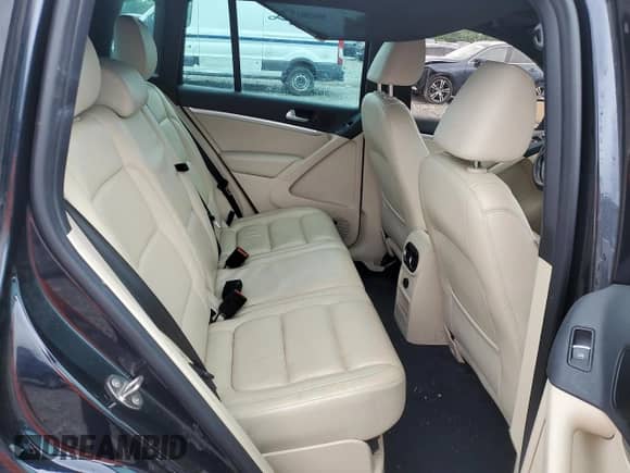 2014 Volkswagen Tiguan SEL with VIN WVGAV3AX7EW101796, listed as a Copart auction lot 60904345 with 97,652 mi miles and Salvage title. Bid and sale history available at DreamBid. Image 10.