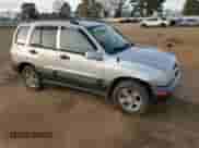 2004 Chevrolet Tracker LT with VIN 2CNBE634X46900683, listed as a Copart auction lot 88601815 with 146,915 mi miles and Salvage title. Bid and sale history available at DreamBid. Image 4.