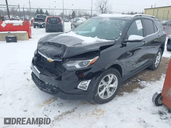 2021 Chevrolet Equinox Premier with VIN 2GNAXNEV9M6150369, listed as a IAAI auction lot 41315549 with 57,614 mi miles and . Bid and sale history available at DreamBid. Image 17.