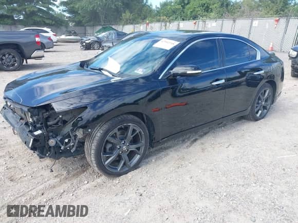 2014 Nissan Maxima S z VIN 1N4AA5AP5EC446974, wystawiony jako IAAI lot #42992248 z przebiegiem 146 715 mil mil oraz . Historia ofert i sprzedaży dostępna na DreamBid. Obrazek 2.