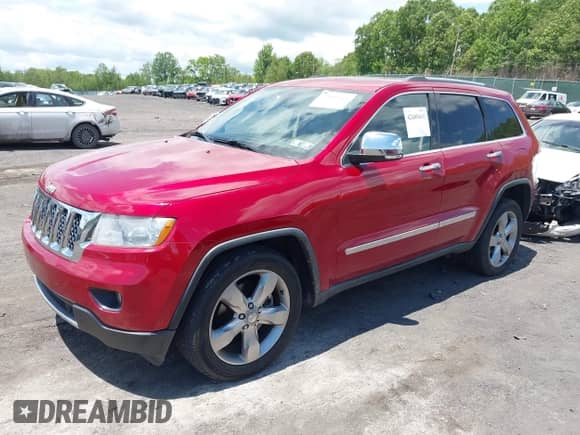 2011 Jeep Grand Cherokee Overland z VIN 1J4RR6GT5BC517175, wystawiony jako IAAI lot #42400415 z przebiegiem 197 019 mil mil oraz . Historia ofert i sprzedaży dostępna na DreamBid. Obrazek 2.