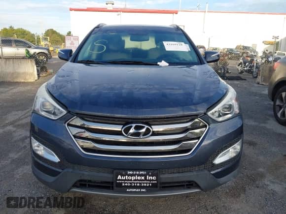 2016 Hyundai Santa Fe z VIN 5XYZWDLA9GG361278, wystawiony jako IAAI lot #43169128 z przebiegiem Nie podano mil oraz . Historia ofert i sprzedaży dostępna na DreamBid. Obrazek 11.