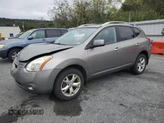 2010 Nissan Rogue S with VIN JN8AS5MVXAW601159, listed as a Copart auction lot 86510585 with 205,297 mi miles and Salvage title. Bid and sale history available at DreamBid. Image 1.