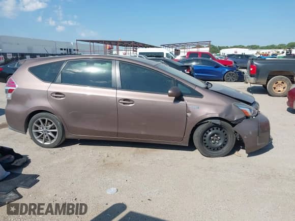 2015 Toyota Prius Two z VIN JTDZN3EUXFJ040580, wystawiony jako IAAI lot #43136665 z przebiegiem 348 625 mil mil oraz . Historia ofert i sprzedaży dostępna na DreamBid. Obrazek 12.