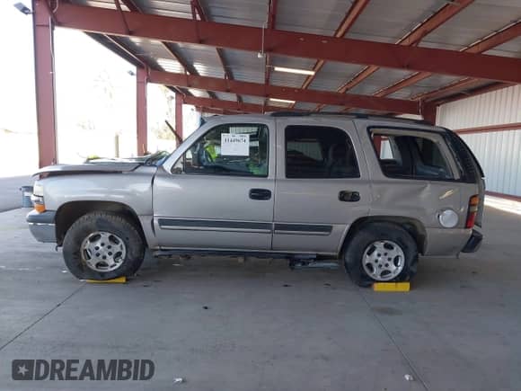 2005 Chevrolet Tahoe LS with VIN 1GNEC13T65J172986, listed as a IAAI auction lot 41449674 with 252,129 mi miles and . Bid and sale history available at DreamBid. Image 13.