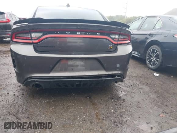 2021 Dodge Charger Scat Pack Widebody with VIN 2C3CDXGJ2MH648700, listed as a IAAI auction lot 43170230 with 44,217 mi miles and . Bid and sale history available at DreamBid. Image 6.