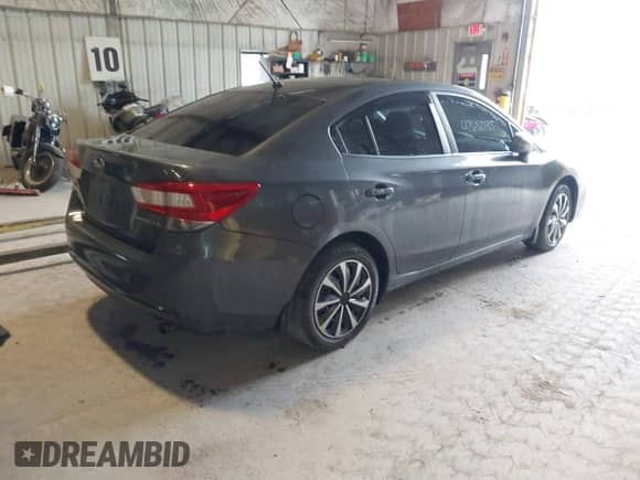 2019 Subaru Impreza with VIN 4S3GKAA61K3603509, listed as a IAAI auction lot 42652135 with 112,990 mi miles and . Bid and sale history available at DreamBid. Image 4.