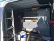 2007 Ford Econoline Cargo Commercial with VIN 1FTNE14W07DB41164, listed as a IAAI auction lot 41566579 with 206,127 mi miles and . Bid and sale history available at DreamBid. Image 8.