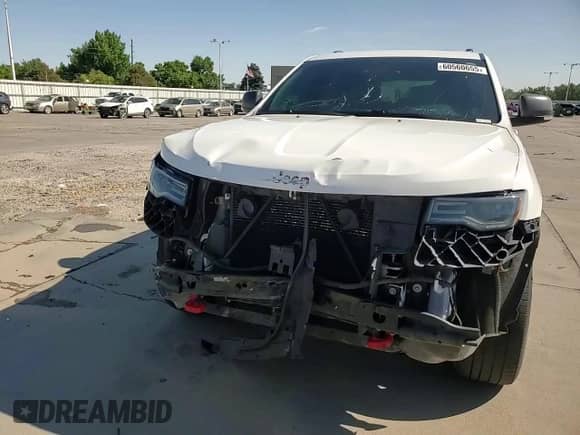 2018 Jeep Grand Cherokee Trailhawk с VIN 1C4RJFLT1JC263949, выставлен на аукционе Copart как лот 60560655 с пробегом 108 050 миль миль и Списание • Salvage title. История ставок и продаж доступна на DreamBid. Изображение 15.
