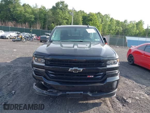 2017 Chevrolet Silverado 1500 LTZ z VIN 3GCUKSEJ0HG321648, wystawiony jako IAAI lot #42701782 z przebiegiem 143 515 mil mil oraz . Historia ofert i sprzedaży dostępna na DreamBid. Obrazek 12.