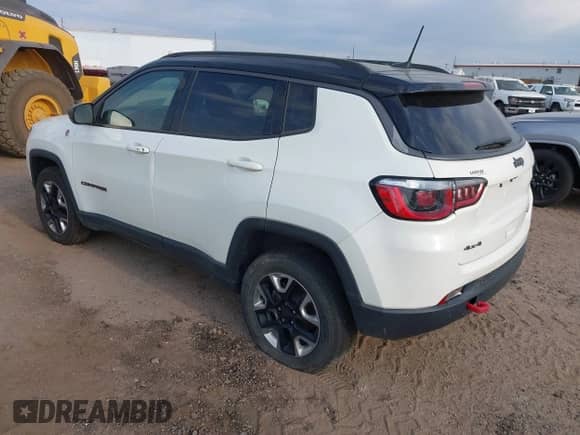 2018 Jeep Compass Trailhawk z VIN 3C4NJDDB8JT234574, wystawiony jako IAAI lot #43049041 z przebiegiem 93 968 mil mil oraz . Historia ofert i sprzedaży dostępna na DreamBid. Obrazek 3.