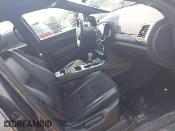 2019 Jeep Grand Cherokee Altitude with VIN 1C4RJFAG5KC601781, listed as a IAAI auction lot 42727617 with 72,702 mi miles and . Bid and sale history available at DreamBid. Image 5.