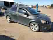 2013 Chevrolet Sonic LTZ с VIN 1G1JE5SH7D4226596, выставлен на аукционе Copart как лот 40272184 с пробегом 150 981 миль миль и Списание • Salvage title. История ставок и продаж доступна на DreamBid. Изображение 4.