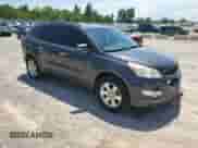 2010 Chevrolet Traverse 1LT with VIN 1GNLVFED3AS138545, listed as a Copart auction lot 61566595 with 100,988 mi miles and Salvage title. Bid and sale history available at DreamBid. Image 4.