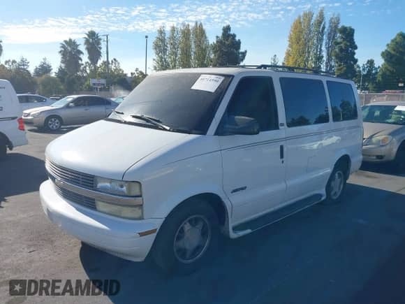 2002 Chevrolet Astro z VIN 1GNDM19X72B125295, wystawiony jako IAAI lot #40714590 z przebiegiem 190 607 mil mil oraz . Historia ofert i sprzedaży dostępna na DreamBid. Obrazek 2.