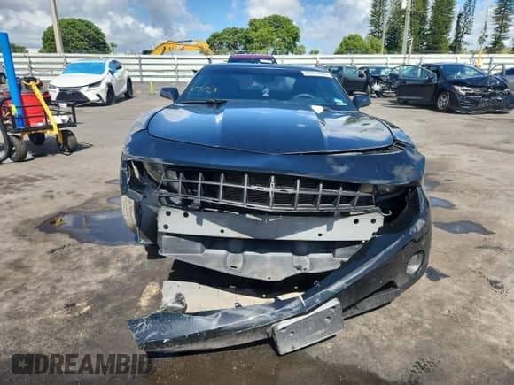 2012 Chevrolet Camaro 2LS с VIN 2G1FA1E36C9181723, выставлен на аукционе Copart как лот 60271305 с пробегом 139 530 миль миль и Списание • Salvage title. История ставок и продаж доступна на DreamBid. Изображение 5.