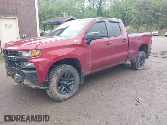 2019 Chevrolet Silverado 1500 Custom Trail Boss with VIN 1GCRYCEFXKZ412861, listed as a IAAI auction lot 42307362 with 112,008 mi miles and . Bid and sale history available at DreamBid. Image 2.