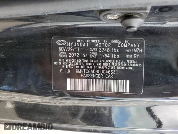 2012 Hyundai Veloster w/Gray Int z VIN KMHTC6AD8CU046631, wystawiony jako Copart lot #68106965 z przebiegiem 120 090 mil mil oraz Szkoda całkowita • Salvage title. Historia ofert i sprzedaży dostępna na DreamBid. Obrazek 12.