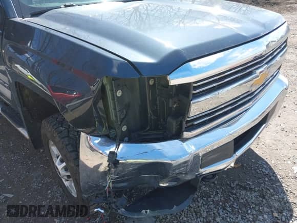2017 Chevrolet Silverado 2500HD Work Truck z VIN 1GC1KUEG0HF219674, wystawiony jako IAAI lot #41883430 z przebiegiem 94 113 mil mil oraz . Historia ofert i sprzedaży dostępna na DreamBid. Obrazek 6.