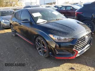 2021 Hyundai Veloster z VIN KMHT36AH3MU010222, wystawiony jako IAAI lot #41754524 z przebiegiem 25 128 mil mil oraz . Historia ofert i sprzedaży dostępna na DreamBid. Obrazek 1.