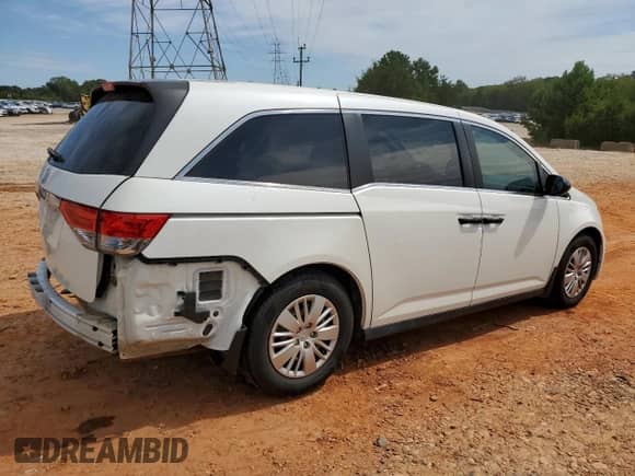 2015 Honda Odyssey LX z VIN 5FNRL5H29FB129947, wystawiony jako Copart lot #70269615 z przebiegiem 85 974 mil mil oraz Szkoda całkowita • Salvage title. Historia ofert i sprzedaży dostępna na DreamBid. Obrazek 3.