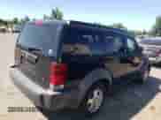 2007 Dodge Nitro SXT with VIN 1D8GT28K77W659757, listed as a Copart auction lot 63344815 with 140,843 mi miles and Salvage title. Bid and sale history available at DreamBid. Image 3.