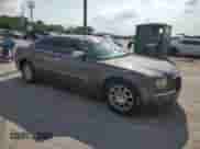 2009 Chrysler 300 C Hemi with VIN 2C3LA63T99H600547, listed as a Copart auction lot 54793715 with 241,729 mi miles and Salvage title. Bid and sale history available at DreamBid. Image 4.