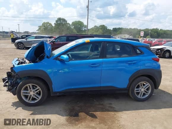 2020 Hyundai Kona SE z VIN KM8K12AA2LU471679, wystawiony jako IAAI lot #42974204 z przebiegiem 97 747 mil mil oraz . Historia ofert i sprzedaży dostępna na DreamBid. Obrazek 14.