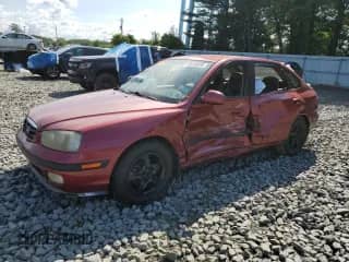 2003 Hyundai Elantra GT z VIN KMHDN55D93U080547, wystawiony jako Copart lot #65409295 z przebiegiem Nie podano mil oraz Szkoda całkowita • Salvage title. Historia ofert i sprzedaży dostępna na DreamBid. Obrazek 1.