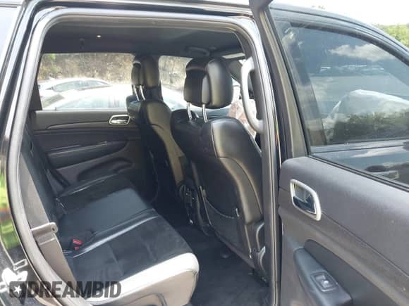 2017 Jeep Grand Cherokee Altitude with VIN 1C4RJFAGXHC864549, listed as a IAAI auction lot 42603675 with 151,648 mi miles and . Bid and sale history available at DreamBid. Image 8.