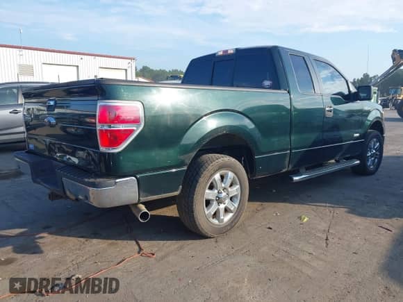 2013 Ford F-150 XL with VIN 1FTFX1CT0DFC31890, listed as a IAAI auction lot 42867290 with 329,051 mi miles and . Bid and sale history available at DreamBid. Image 4.