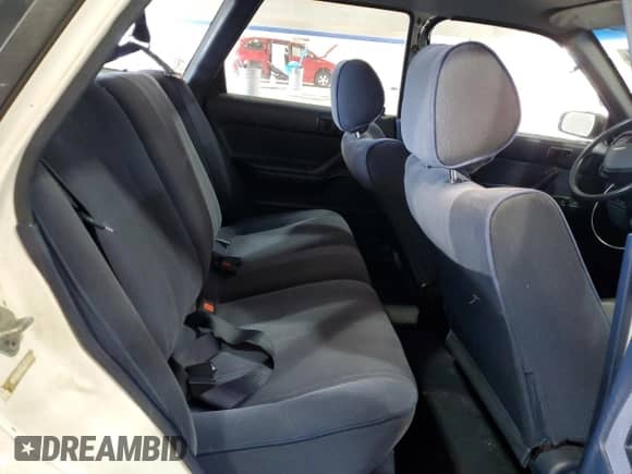 1991 Toyota Camry z VIN JT2SV21W7M0380204, wystawiony jako Copart lot #72694404 z przebiegiem 242 162 mil mil oraz Szkoda całkowita • Salvage title. Historia ofert i sprzedaży dostępna na DreamBid. Obrazek 10.