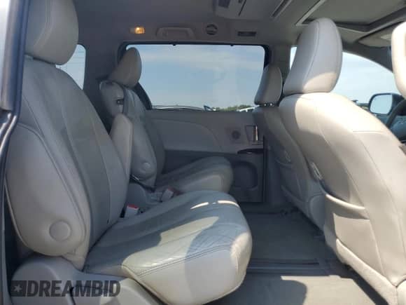 2012 Toyota Sienna XLE with VIN 5TDYK3DC8CS176623, listed as a Copart auction lot 80257225 with 262,472 mi miles and Salvage title. Bid and sale history available at DreamBid. Image 11.