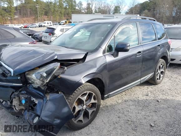 2016 Subaru Forester XT Touring z VIN JF2SJGVC4GH504050, wystawiony jako IAAI lot #41630998 z przebiegiem 64 781 mil mil oraz . Historia ofert i sprzedaży dostępna na DreamBid. Obrazek 17.