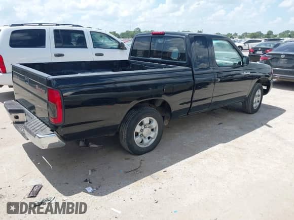 2000 Nissan Frontier XE with VIN 1N6DD26S7YC359637, listed as a IAAI auction lot 42752725 with 340,199 mi miles and . Bid and sale history available at DreamBid. Image 4.