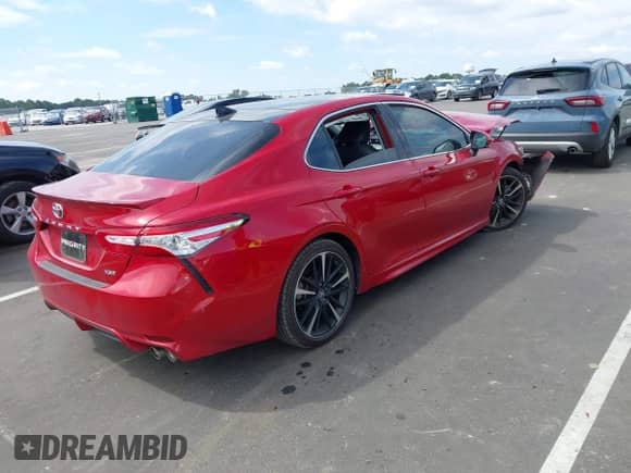 2020 Toyota Camry XSE z VIN 4T1K61AK3LU317132, wystawiony jako IAAI lot #43239395 z przebiegiem 59 174 mil mil oraz . Historia ofert i sprzedaży dostępna na DreamBid. Obrazek 4.