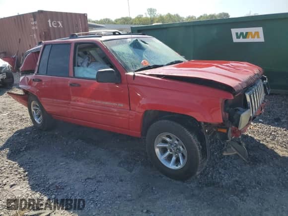 1998 Jeep Grand Cherokee with VIN 1J4FX48S1WC257401, listed as a Copart auction lot 69578044 with Not provided miles and Salvage title. Bid and sale history available at DreamBid. Image 4.