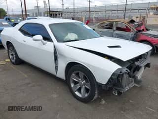 2019 Dodge Challenger SXT z VIN 2C3CDZAG6KH669989, wystawiony jako IAAI lot #43333069 z przebiegiem 161 866 mil mil oraz . Historia ofert i sprzedaży dostępna na DreamBid. Obrazek 1.