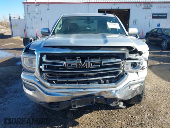 2017 GMC Sierra 1500 SLE with VIN 1GTV2MEC5HZ404851, listed as a IAAI auction lot 41733001 with 119,184 mi miles and . Bid and sale history available at DreamBid. Image 6.