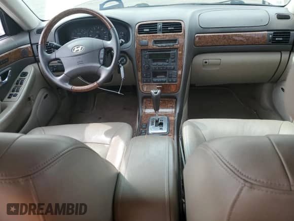 2005 Hyundai XG с VIN KMHFU45E15A406358, выставлен на аукционе Copart как лот 72279454 с пробегом 115 642 миль миль и Списание • Salvage title. История ставок и продаж доступна на DreamBid. Изображение 8.