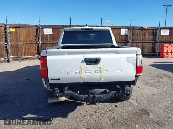 2024 Toyota Tacoma SR5 with VIN 3TYLB5JN9RT004030, listed as a IAAI auction lot 43486815 with 27,397 mi miles and . Bid and sale history available at DreamBid. Image 16.