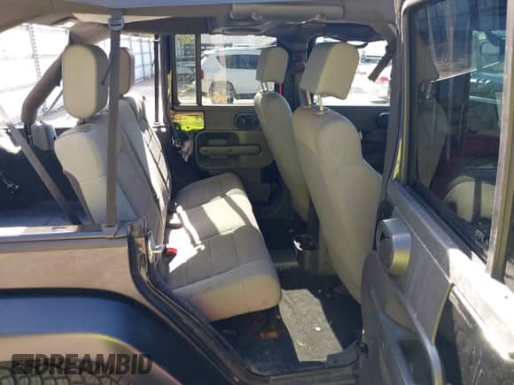 2007 Jeep Wrangler Unlimited Sahara с VIN 1J4GA59187L207002, выставлен на аукционе IAAI как лот 43455938 с пробегом 163 987 миль миль и . История ставок и продаж доступна на DreamBid. Изображение 8.