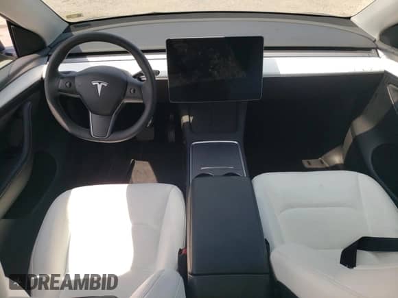 2023 Tesla Model Y Long Range с VIN 7SAYGAEE8PF766761, выставлен на аукционе Copart как лот 60879765 с пробегом Не указан миль и Списание • Salvage title. История ставок и продаж доступна на DreamBid. Изображение 8.
