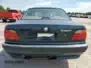 1998 BMW 7 Series 740i with VIN WBAGF8325WDL51588, listed as a Copart auction lot 66292195 with 121,919 mi miles and Salvage title. Bid and sale history available at DreamBid. Image 6.