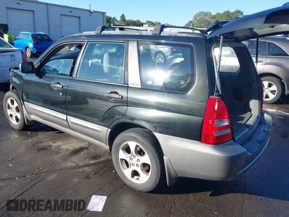 2004 Subaru Forester XS with VIN JF1SG65674H704598, listed as a IAAI auction lot 43323527 with 113,375 mi miles and . Bid and sale history available at DreamBid. Image 3.