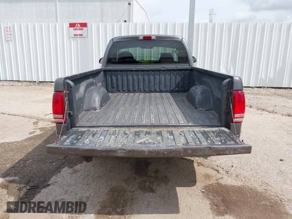 2003 Dodge Dakota с VIN 1D7FL36N13S264980, выставлен на аукционе IAAI как лот 42113283 с пробегом 219 046 миль миль и . История ставок и продаж доступна на DreamBid. Изображение 17.