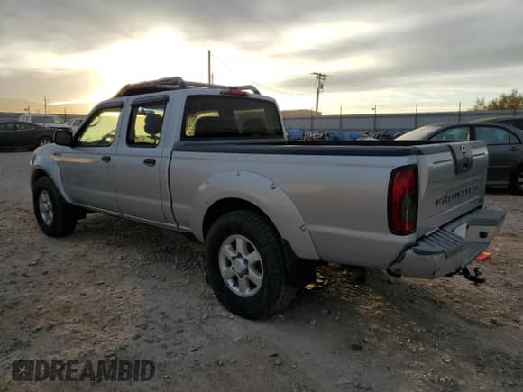 2004 Nissan Frontier SC with VIN 1N6MD29Y74C457769, listed as a Copart auction lot 81005854 with 146,777 mi miles and Clean title. Bid and sale history available at DreamBid. Image 2.