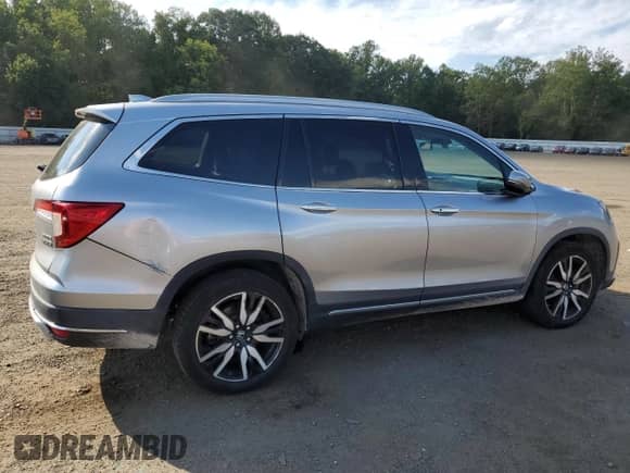 2021 Honda Pilot Touring 8-Passenger с VIN 5FNYF6H91MB014245, выставлен на аукционе Copart как лот 70459685 с пробегом 52 632 миль миль и Списание • Salvage title. История ставок и продаж доступна на DreamBid. Изображение 3.