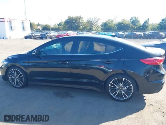 2018 Hyundai Elantra Sport с VIN KMHD04LB1JU509915, выставлен на аукционе IAAI как лот 43205356 с пробегом 98 340 миль миль и . История ставок и продаж доступна на DreamBid. Изображение 14.