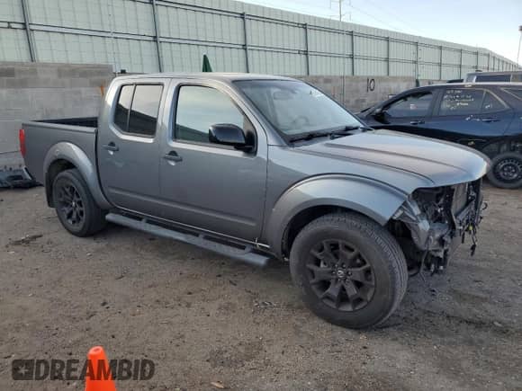 2021 Nissan Frontier SV with VIN 1N6ED0EA7MN701233, listed as a Copart auction lot 63864655 with 49,035 mi miles and Salvage title. Bid and sale history available at DreamBid. Image 4.